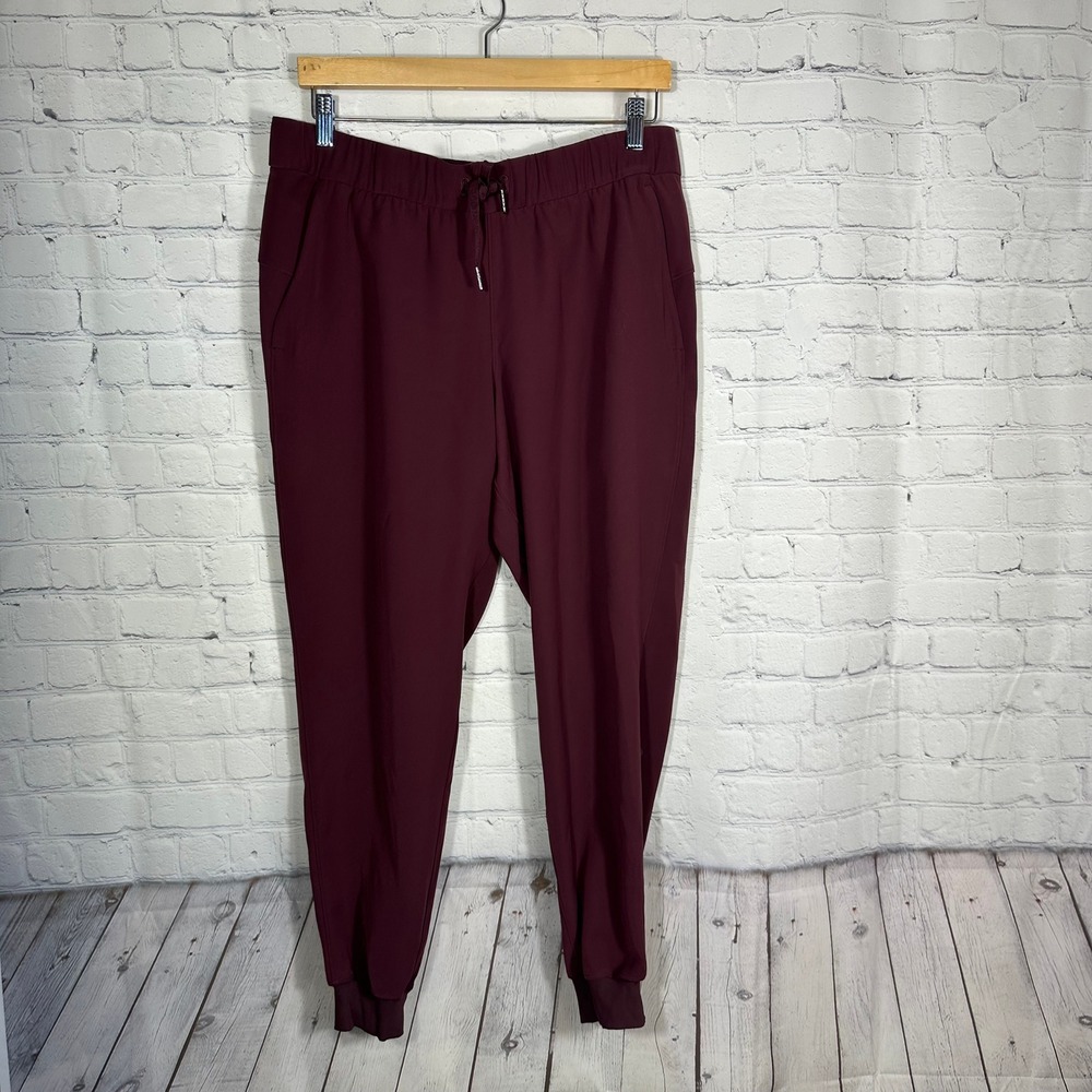 Lululemon On The Fly‎ Joggers 10 Drawstring Pockets Maroon Pants Womens Burgundy